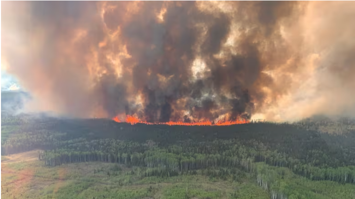 Smoke rises from the Bald Mountain fire near Grande Prairie, Alta., on May 12, 2023. Grande Prairie Regional Hospital was a staging ground for displaced patients three times during last year's record-breaking fire season. (Alberta Wildfire/Reuters)